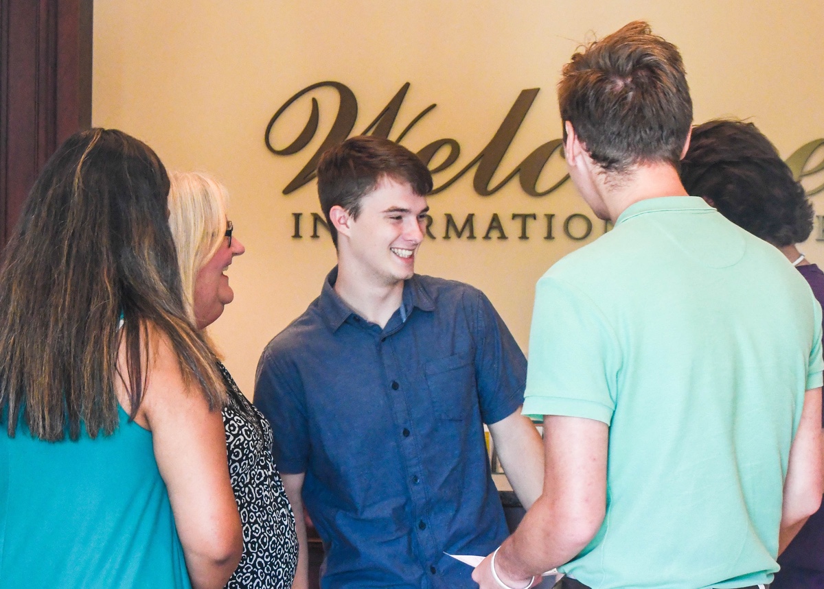 A group of people at our welcome center